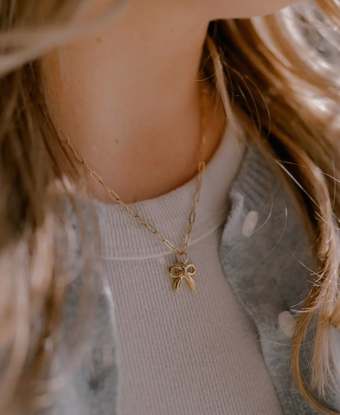 He Holds All - Bow Necklace